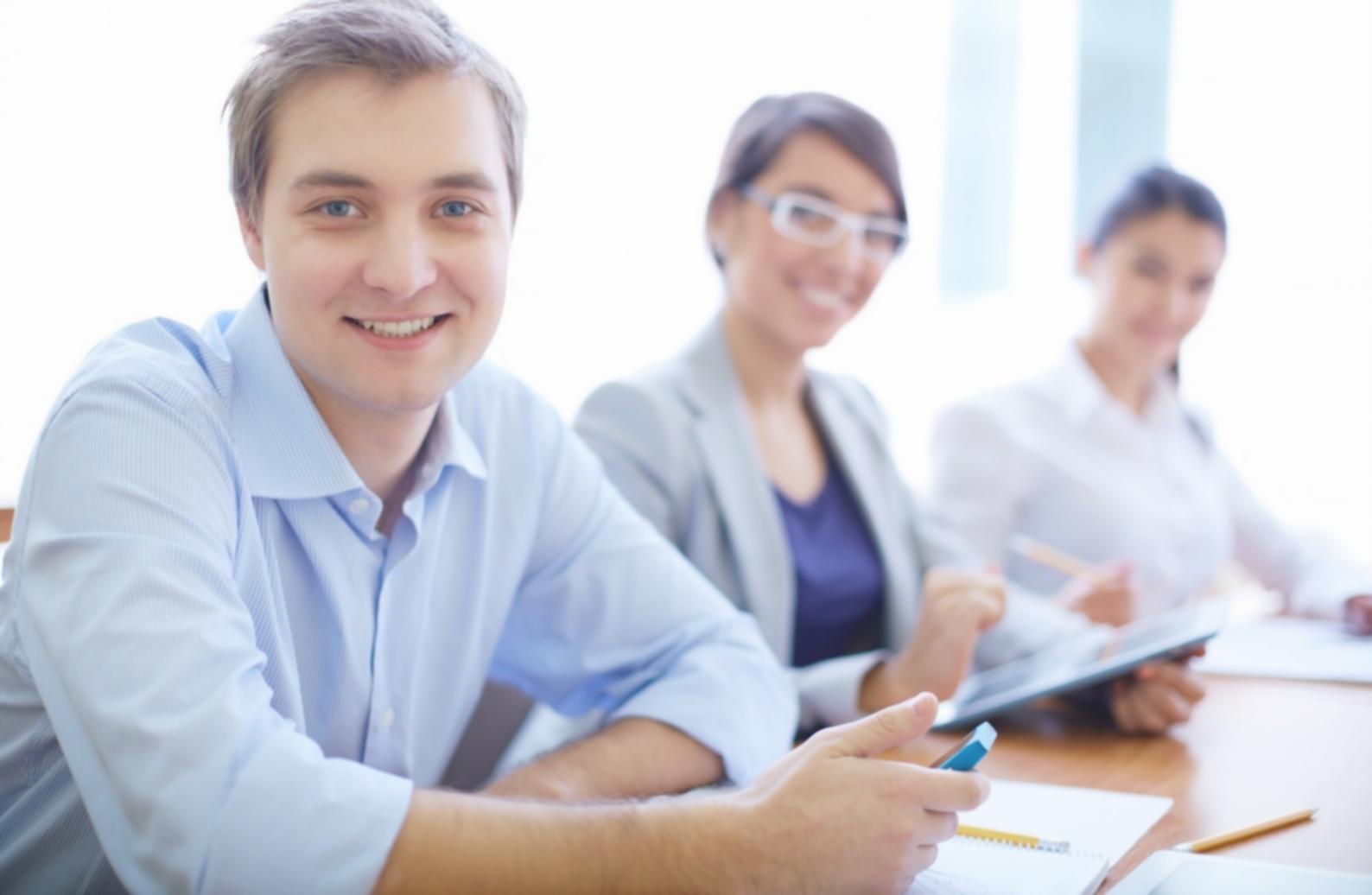 Team workspace with financial planning materials and budget analysis tools